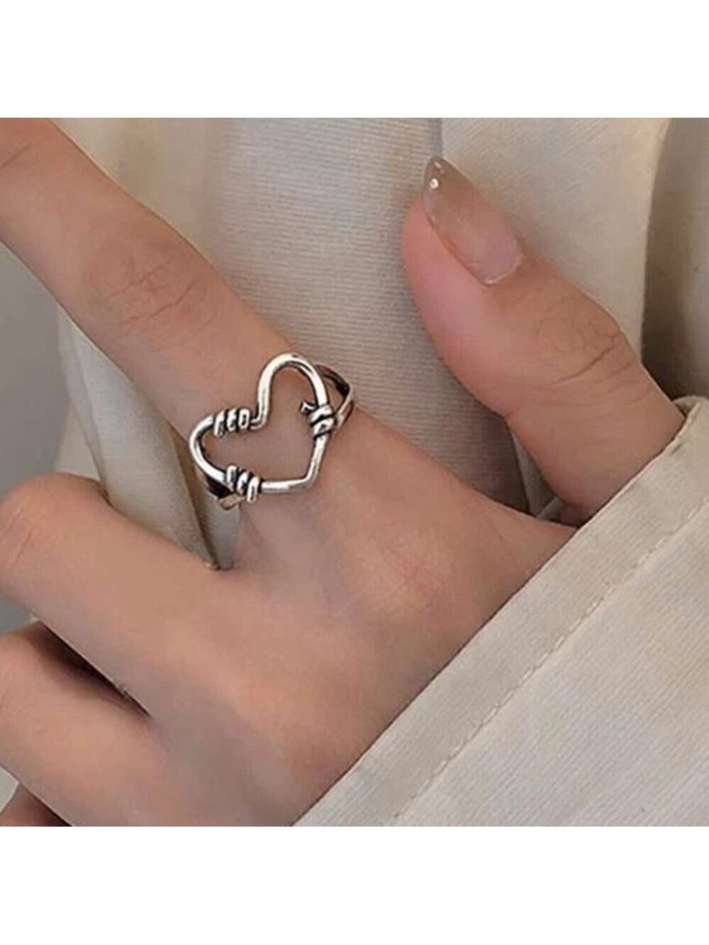Wrapped heart finger cuff ring